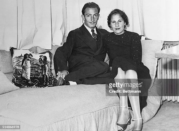Salvador Dali and lifelong love Gala in Dali's Paris studio in 1934. Gala was married to poet Paul Eluard when this photograph was taken. After...