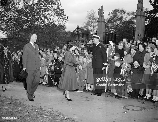 Washington, D.C.: Youngsters of British Commonwealth nations give Princess Elizabeth their full attention as she arrives at the British Embassy to be...