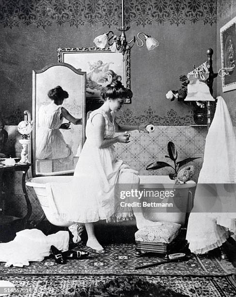 This photograph from the late nineteenth century showing a lady preparing for a bath represents some of the most daring and risque photography of the...