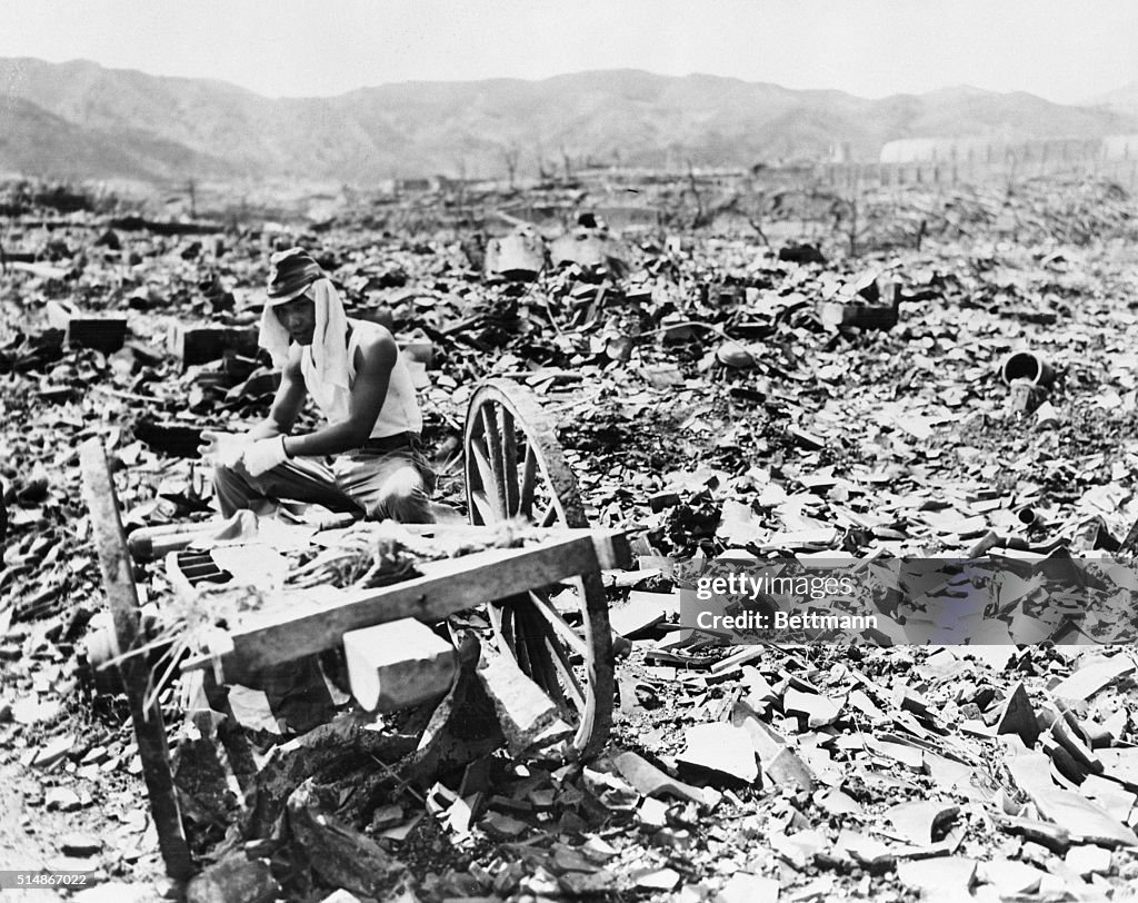 Japanese Soldier Salvaging in Rubble