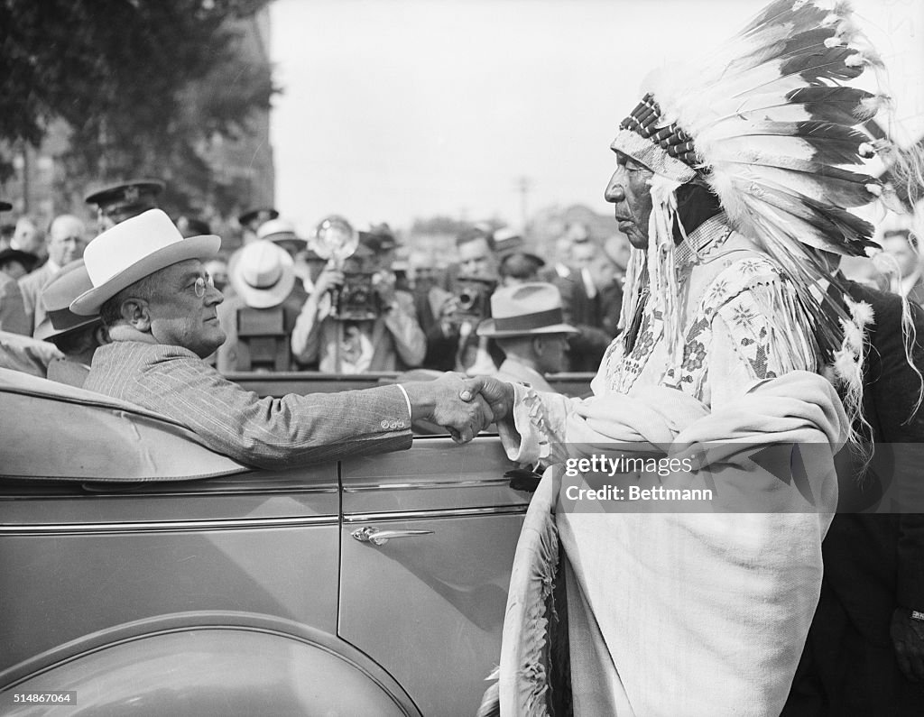 President Roosevelt and Chief Noal Bad Wound Shaking Hands