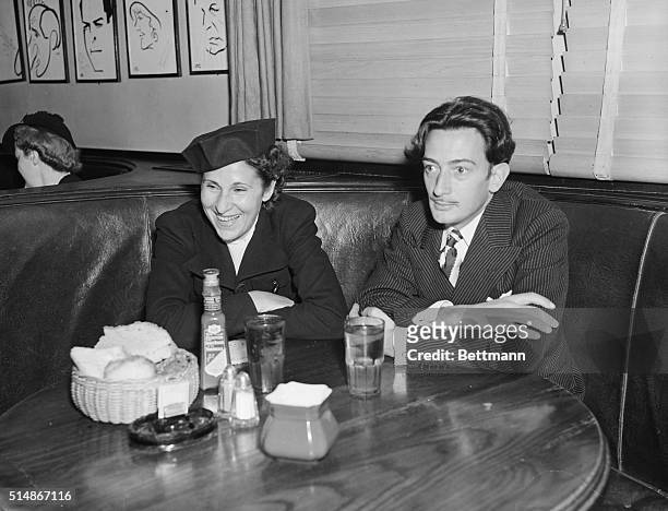 Salvador Dali and lifelong love Gala at Hollywood's Brown Derby restaurant in February 1937. Gala was married to poet Paul Eluard when this...