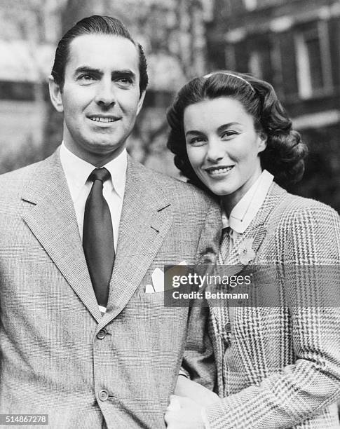 London, England: Film actor Tyrone Power and his bride of six weeks, the former Linda Christian, walk along the River Thames shortly after their...