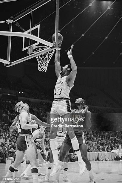 Los Angeles Lakers' center Wilt Chamberlain shoots uncontested during a game against the San Diego Rockets at The Forum in Inglewood, California.