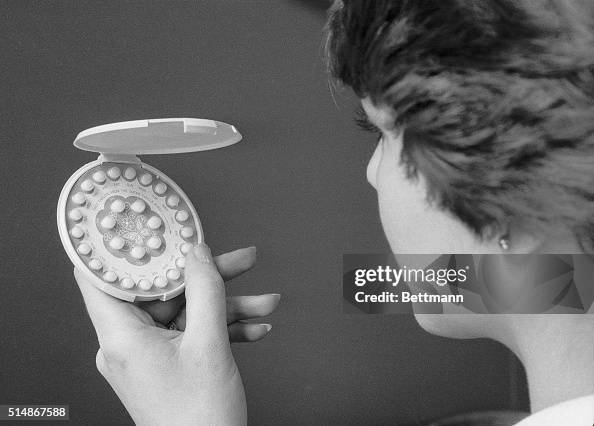 Woman Holding Birth Control Pills Woman Holding Birth Control Pills