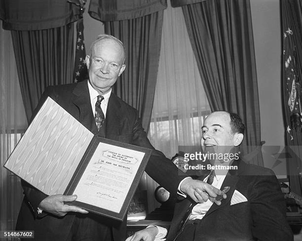 Washington, DC: Dr. Von Neumann receives Freedom Medal: President Eisenhower is shown as he presented a citation and medal of Freedom to Dr. John Von...