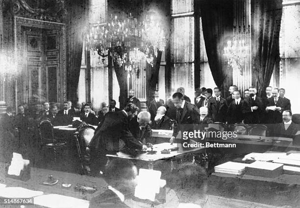 The historic scene in the Hall of Mirrors at Versailles, on June 28 five years to a day since the assassination of Ferdinand at Sarajevo, as Georges...