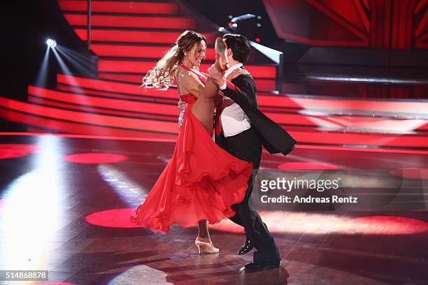 Sonja Kirchberger and Ilia Russo perform on stage during the 1st show of the television competition 'Let's Dance' on March 11, 2016 in Cologne,...