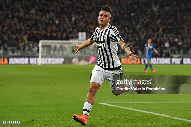Paulo Dybala of Juventus FC celebrates after scoring the opening goal during the Serie A match between Juventus FC and US Sassuolo Calcio at Juventus...