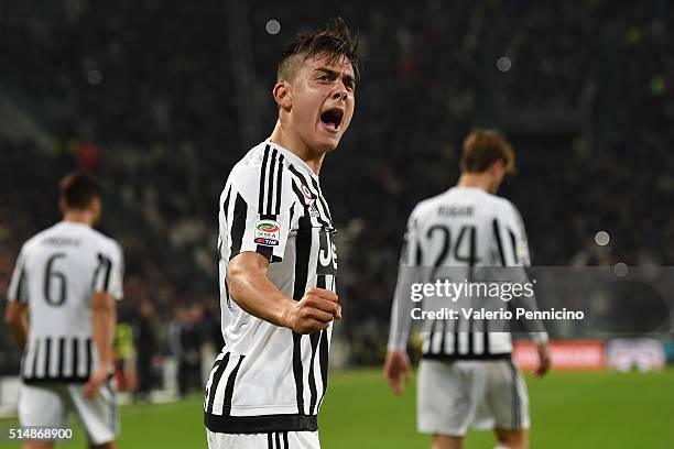 Paulo Dybala of Juventus FC celebrates after scoring the opening goal during the Serie A match between Juventus FC and US Sassuolo Calcio at Juventus...