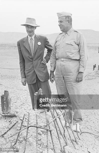 Carrizozok, NM: Here are Dr. J. Robert Oppenheimer, l, University of California, and Maj. Gen. Leslie Groves, Chief of the Manhattan Engineering...