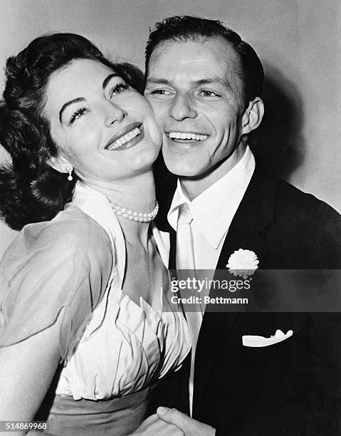 Philadelphia, PA: Crooner Frank Sinatra and his bride Ava Gardner pose for a wedding picture following their marriage last night at Germantown, PA.,...