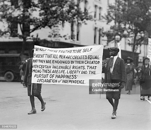 Washington, DC: Some of the more than 3,000 negroes, carrying signs urging control and halting of lynching of negroes, who took part in the protest...