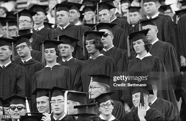 Tuscaloosa, AL: Vivian Malone becomes the first negro to graduate from the University of Alabama. She is shown standing to receive the conferring of...