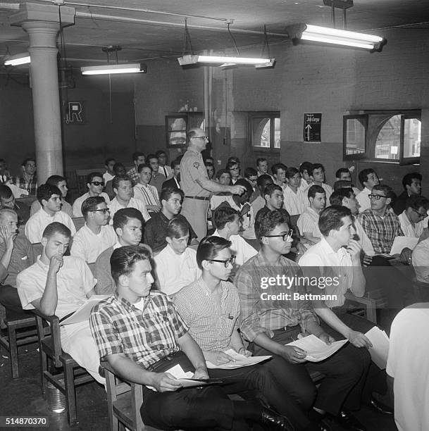 Undated-New York, NY: Youths who were called up wait their turn at a New York induction Center in 1965.