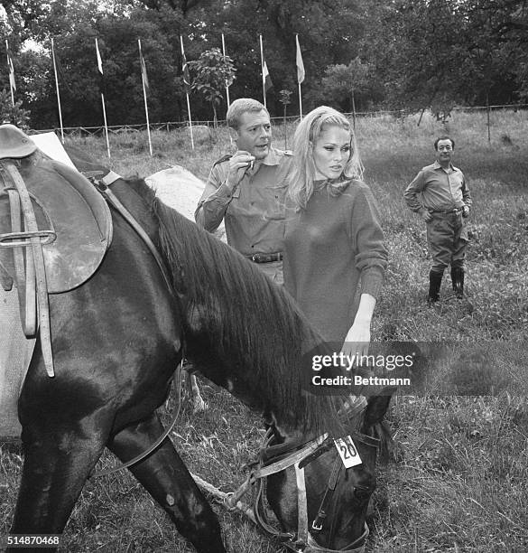 Rome: Ursula Andress and Italy's Marcello Mastroianni make friends with a horse on location in Rome. They are appearing in "The Tenth Victim," a...