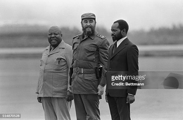 Havana, Cuba: Cuban President Fidel Castro is flanked by Leabua Jonathan, Prime Minister of Lesotho and Samora Moises Machel, President of...
