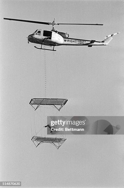 Burbank, CA: Suspended 300 feet in the air from a helicopter during the premiere of "Dick Clark's Live Wednesday," 9/20, stunt daredevil Dar Robinson...