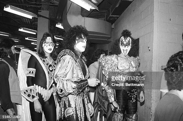 New York, NY: Rock group KISS backstage at Madison Square Garden just before start of their concert before 20,000 fans. Left to right are: Ace...