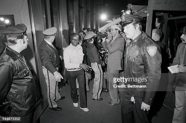 New York, NY: Grever Davis one of seven elderly survivers of the Jonestown mass murder-suicide who were flown back to the U.S. Walks briefly through...