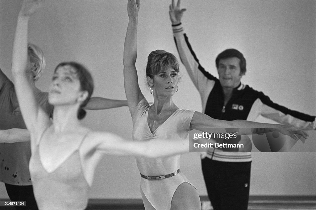 Jane Fonda and Mike Douglas Exercising