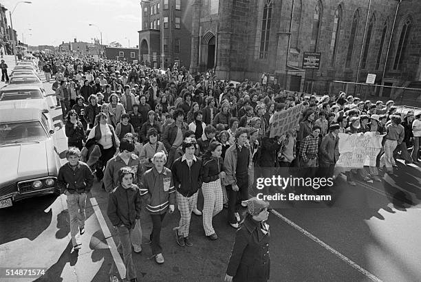 Boston, MA: Thousands of white students boycotted classes and joined their parents in a noisy, 3 1/2-mile protest march through South Boston 10/4, on...