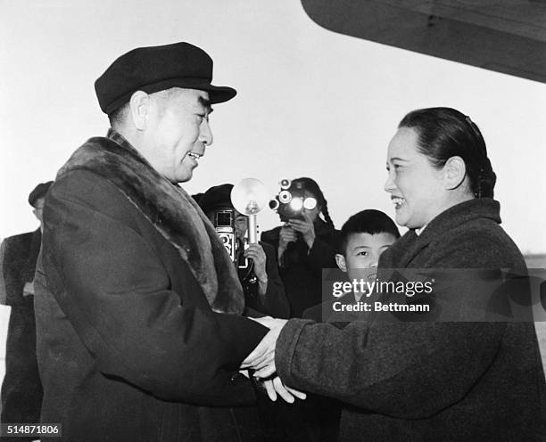 Chinese Premier Zhou Enlai warmly greets Soong Ch'ing-ling, Vice Chairman of the Standing Committee of the National People's Congress of Communist...