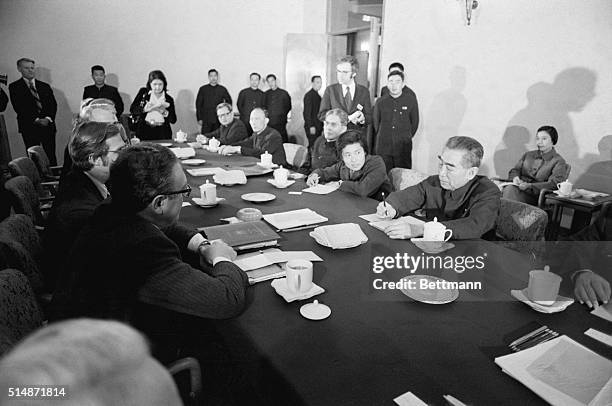 Peking, China: Final negotiating session between secretary of State Kissinger and Chou En Lai in te Secretary's villa. On Chou's right: Translator:...