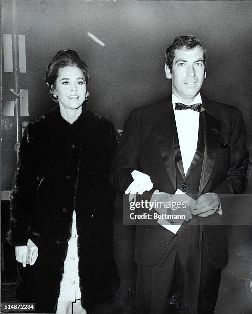 Star Jane Fonda, wearing a black mini-mink by Georges Kaplan, and husband Roger Vadim were among the guests at the glittering American premiere of...