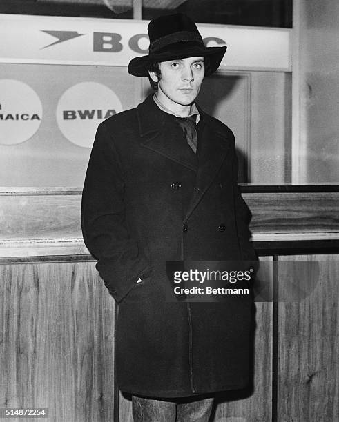 Actor Terence Stamp arrives at JFK Airport to attend the N.Y. Premiere of his film: Poor Cow. February, 1968.