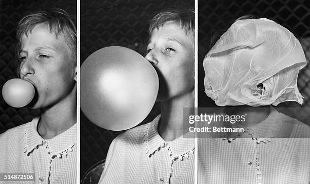 Helen Sasak, 12 years old, blows a giant bubble until it crashes on her face, to win a bubble gum blowing contest in Chicago.