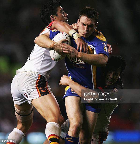 Kevin Sinfield of Leeds breaks through the Bradford defence during the Tetley's Super League Grand Final match between Bradford Bulls and Leeds...