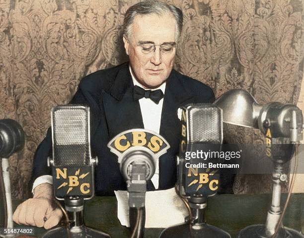 President Franklin D. Roosevelt delivers a radio address during one of his Fireside Chats.