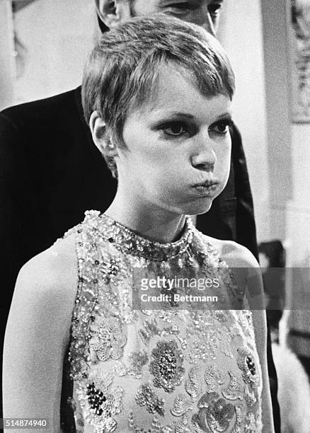 Actress Mia Farrow puffs out her cheeks and looks cross during location filming here March 1 of her latest movie, "A Dandy in Aspic." Mia, whose...