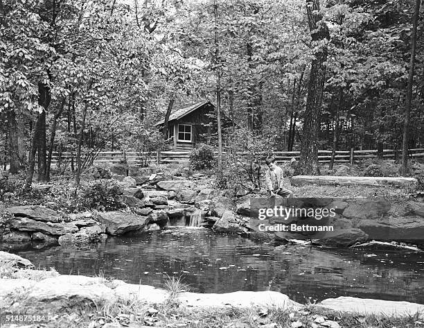 "Shangri-La." A boy fishing at Franklin D. Roosevelt's lodge, "Shangri-La."