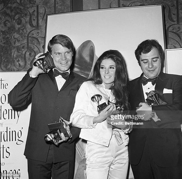 Glen Campbell, Bobbie Gentry and Lala Schifrin hold the statuettes they won at the 1968 Grammy awards ceremony in Los Angeles.