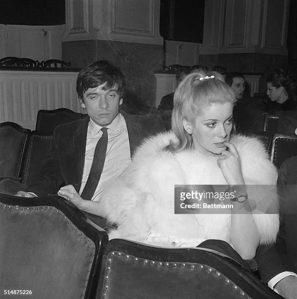 During a meditative moment, Catherine Deneuve nibbles her finger. The French actress might have been thinking nervously about the audience reaction...