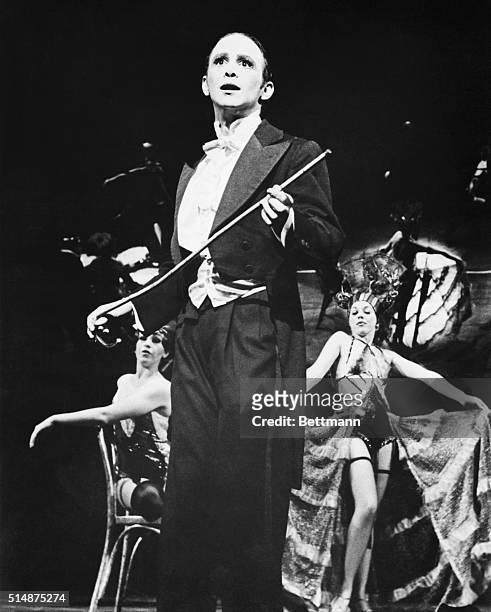 Joel Grey onstage as the "Master of Ceremonies" on Broadway in 1967. His repeat of this performance in the 1972 film would earn him both an Academy...
