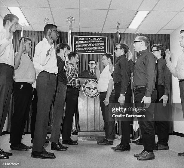 Young men from western Pennsylvania are sworn in to the Army after being drafted for the Vietnam War in 1967.