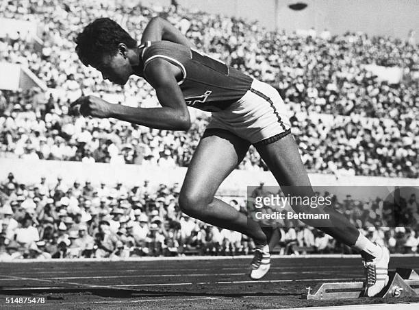 American Wilma Rudolph springs from the starting blocks in a qualifying heat for the women's 200-meter dash at the 1960 Summer Olympics in Rome. She...