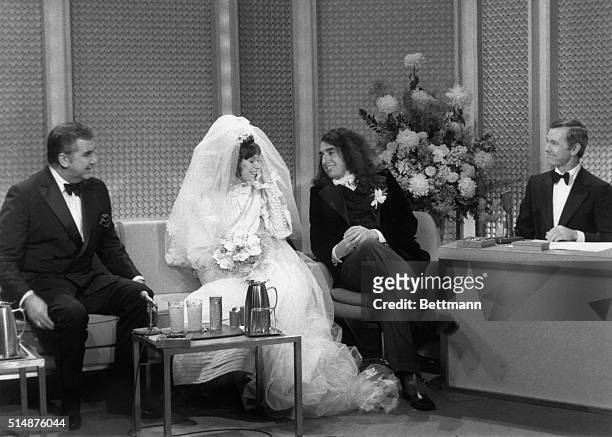 Tiny Tim, best-known for his falsetto rendition of "Tiptoe Through the Tulips," marries his fiancee, "Miss Vicky," on Johnny Carson's Tonight Show....