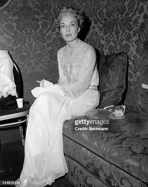 New York, NY: Mrs. Harrison Williams, one of Society's best dressed women, is shown in her box at the Metropolitan Opera here, at the opening...