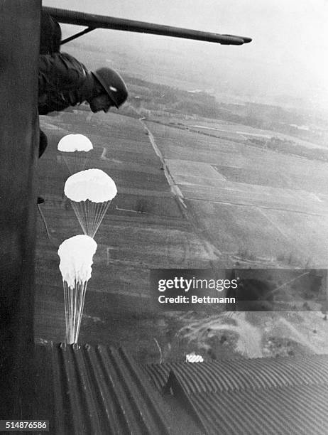 WW2 Propaganda photo of German parachutist jumping from plane WW2 Propaganda photo of German parachutist jumping from plane