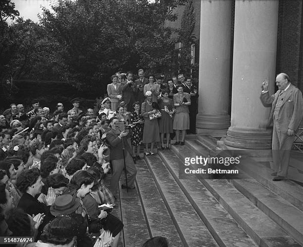 Washington, DC: Prime Minister Winston Churchill of Great Britain addresses members of the British Embassy staff in Washington, and members of the...