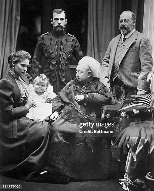 Queen Victoria and her son, Prince Edward VII , with Russian Emperor Nicholas II, his wife Alexandra, and their newborn daughter, Olga.