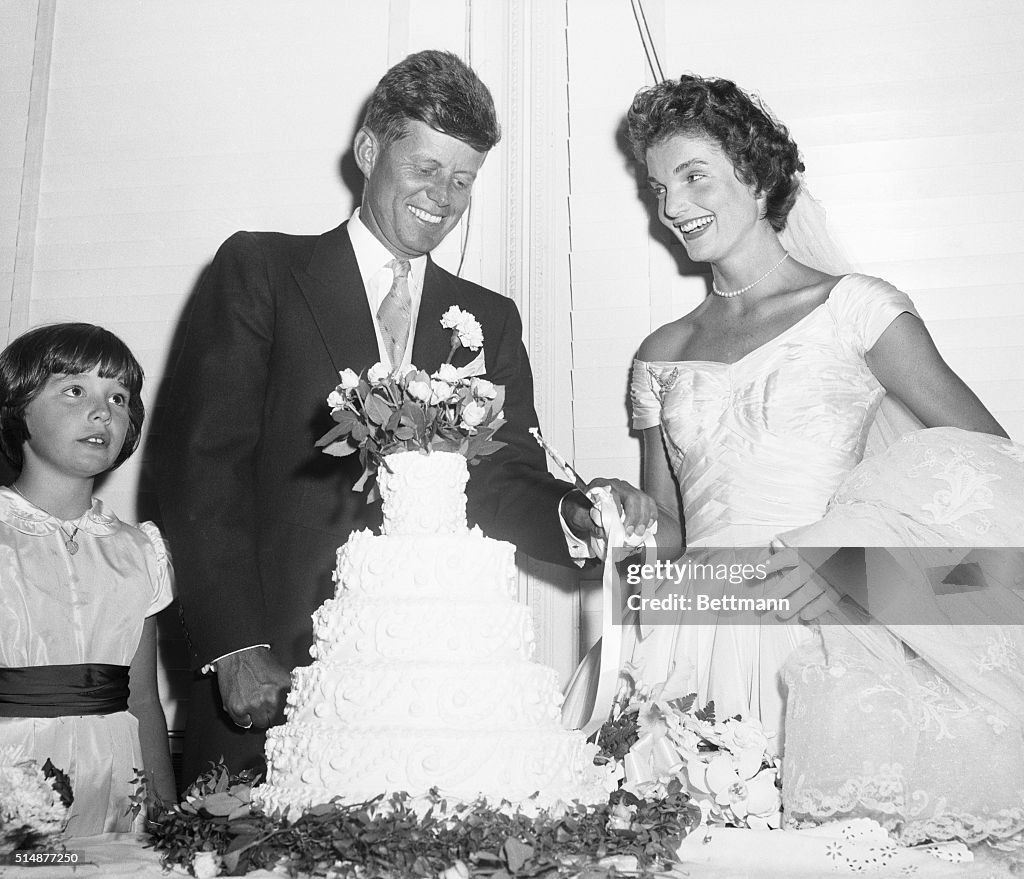 John and Jacqueline Kennedy Cut Wedding Cake