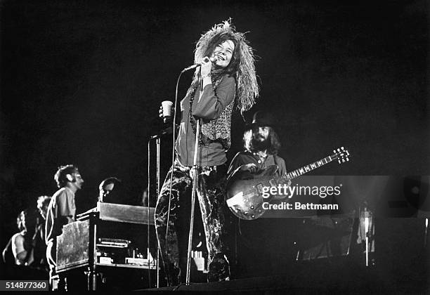 Janis Joplin and her final group, the Full Tilt Boogie Band, perform at the Festival for Peace at Shea Stadium.
