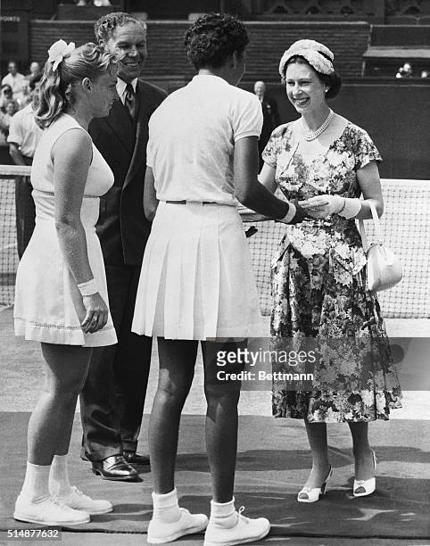 Wimbledon, England: A picture that makes sports history, snapped at Wimbledon, as her majesty Queen Elizabeth of England awarded the Wimbledon...
