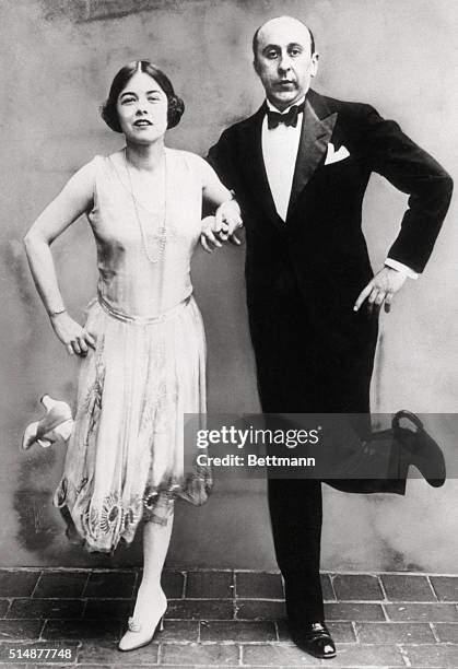 Dance guru Arthur Murray demonstrates a Charleston step with a partner. Murray's nationwide dance studios swept America in the 1920s and are still...