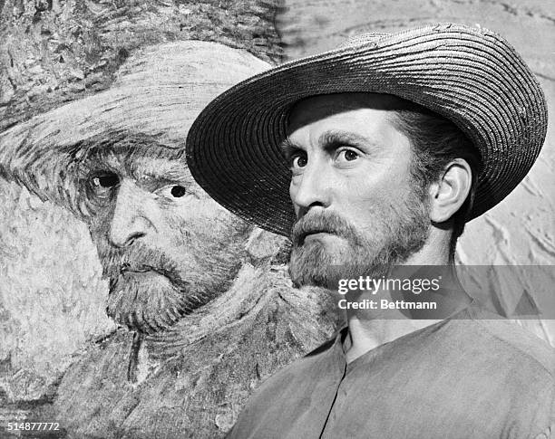Los Angeles, CA: Actor Kirk Douglas poses beside a self-portrait of Vincent Van Gogh, painted by the artist in 1886-1887 to show his remarkable...